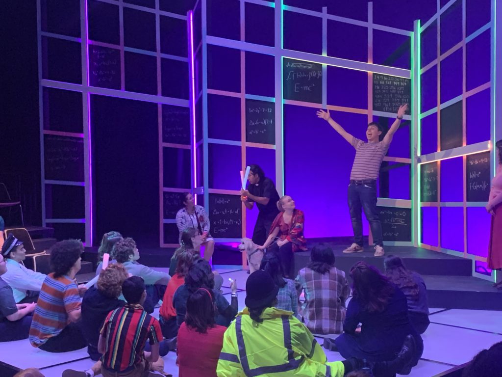 Christopher Boone, played by Shane Reichel, showcases his mathematical skills to the audience and cast mates during a must see post-curtain call scene. Photo credit: Nick Spinarski