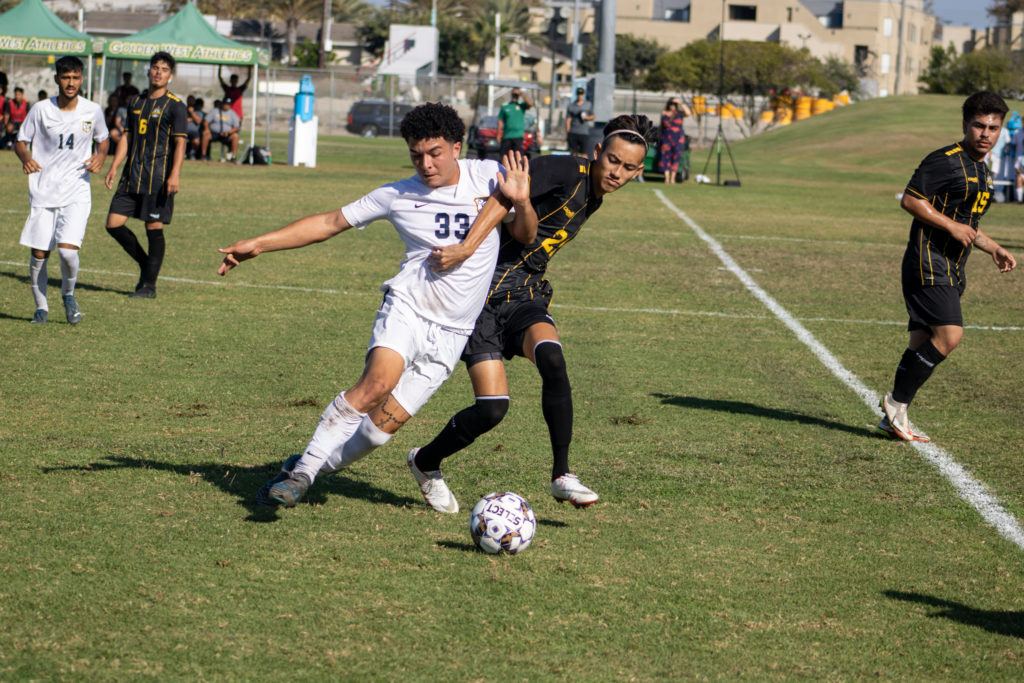 Freshman winger Cristian Carcamo fighting to win the ball during Tuesdays game at Golden West. Photo credit: Bryan Chavez