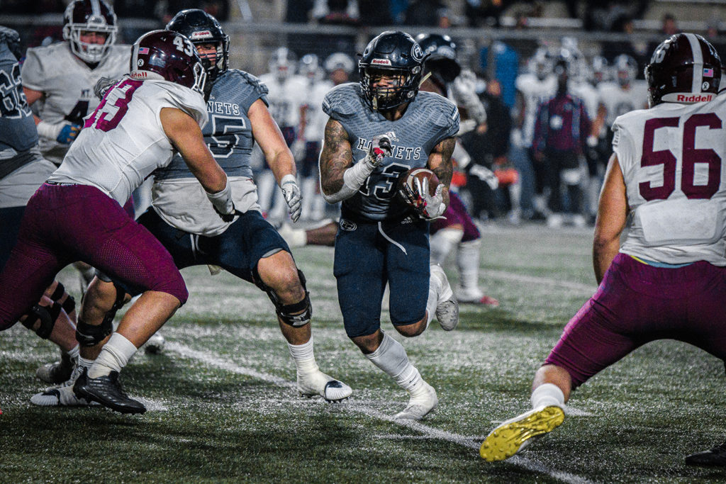 Sophomore Tyrell Greene Jr. looks for an opening to split the defense, going right into Mt. Sac territory, gaining yards for the Hornets on Nov. 26, 2022. Photo credit: Aaliyah Skipper