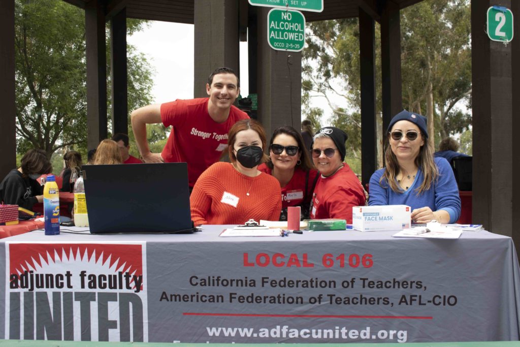 From left, Dashiel Johnson, executive director for Adjunct Faculty United, poses with union members Nora Castro, Marlo Smith, Seija Rohkea, and Iris Zelaya at the union picnic at Craig Regional Park in Fullerton on April 2, 2022. Photo credit: Adjunct Faculty United