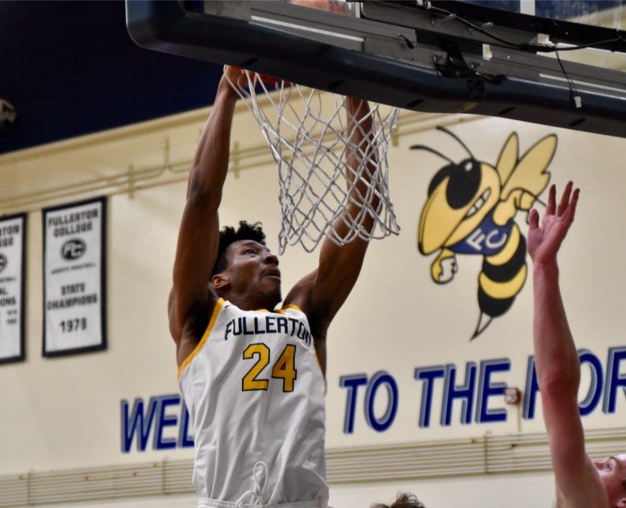 Freshman forward Mike Ofoegbu makes a rim rattling dunk on Wednesday Feb. 1 2023 home game against Santiago Canyon College.