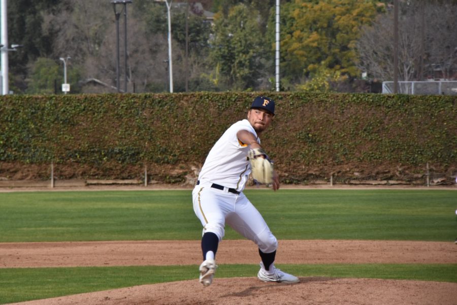 Sophomore closing pitcher, Nathan McManus mid-pitch during Thursday Feb. 2, 2023 home game. McManus seals the win 6-2.