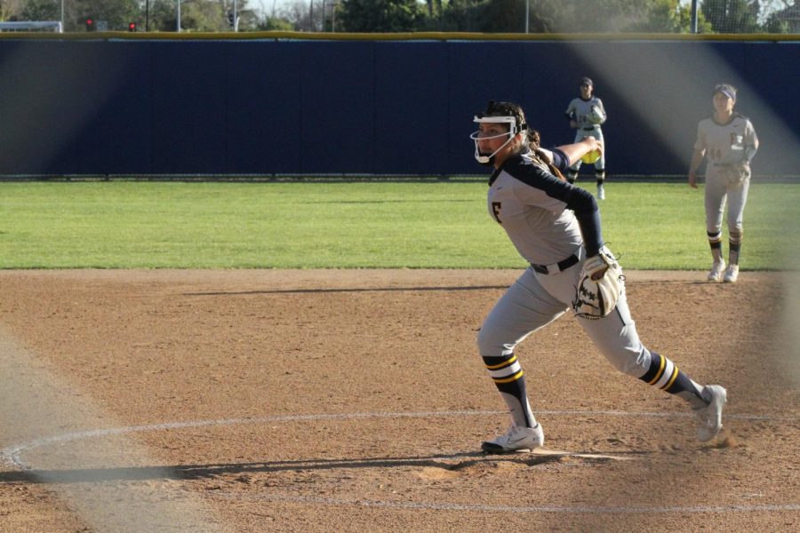 Freshman pitcher Allyson Fuentes winds up at home on Feb. 15, 2023. Photo credit: Yasmin Sotelo