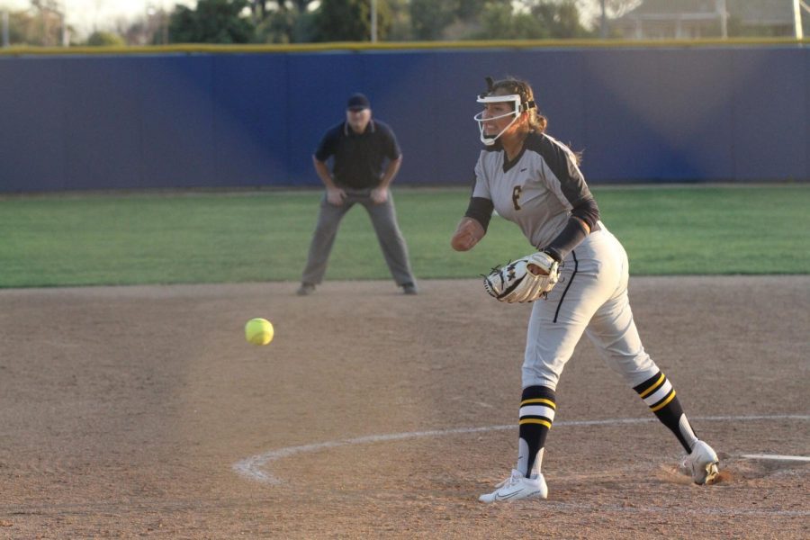Freshman pitcher Allyson Fuentes delivers a pitch at Fullerton on Feb. 15, 2023. Photo credit: Yasmin Sotelo