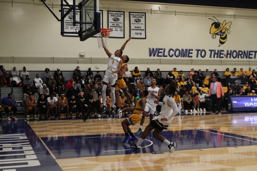 Freshmen Sean Newman Jr. going up for a lay up against West Los Angeles College on Sat. 25, 2023