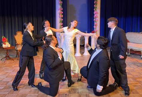Dulcinee (Emily Harrington) wooed by lovers who do not satisfy during her performance in the Opera show Love, Interrupted, at Fullerton College. Photo credit: Aram Barsamian