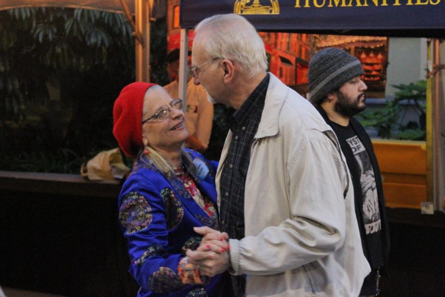 Husband and wife Christine and Jim Garner dance to the tune of "La Vie en Rose," played by the Spencer Bowie Jazz Band. Mrs. Garner had taken French classes at Fullerton College and is on the French Film Festival planning committee. She played accordion with her group Cedar Tree at the event, on Tuesday. March 28.