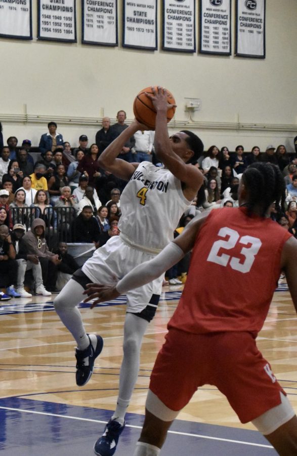 Freshman guard Sean Newman Jr. goes for two in the lane on Saturday March 4, 2023, against San Diego City at the Hornets Nest. Photo credit: Gerardo Chagolla