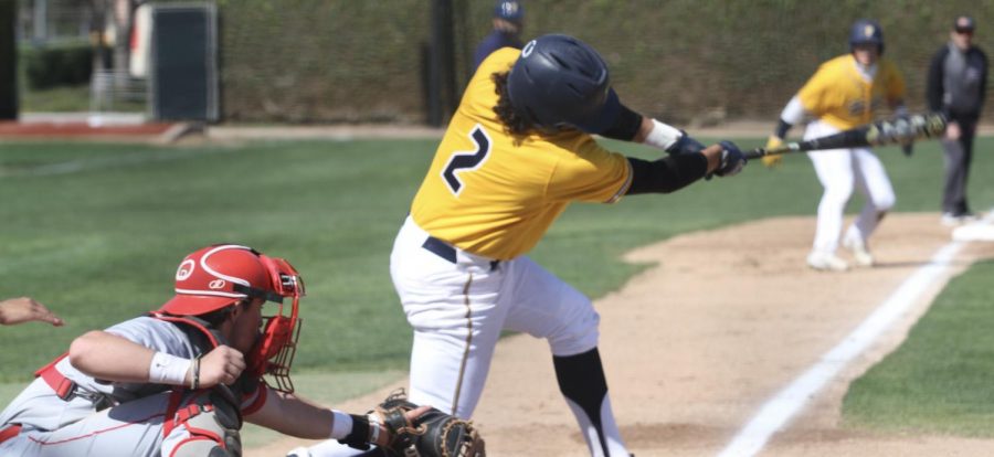 Sophomore shortstop Jimmy Blumberg gets extended in the batter's box at Fullerton College on Friday Mar. 3, 2023.