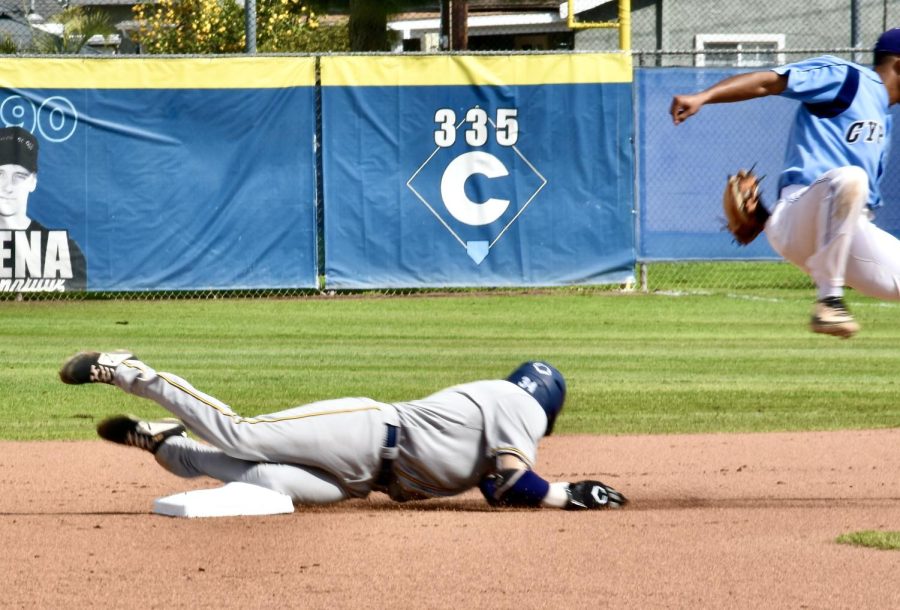 Freshman infielder Tank Espalin slides in dangerously as he steals second base during an away game on Thursday, March 23, 2023.