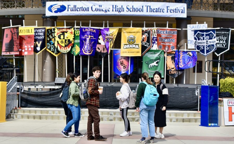Fullerton College students look at the banners placed by the institutions who attended the Fullerton College High School Theater festival. on Mar. 17,2023 Photo credit: Gerardo Chagolla