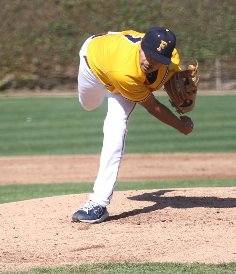 Sophomore RHP Freddy Castanea finishes his delivery at Fullerton College on Friday Mar. 3, 2023