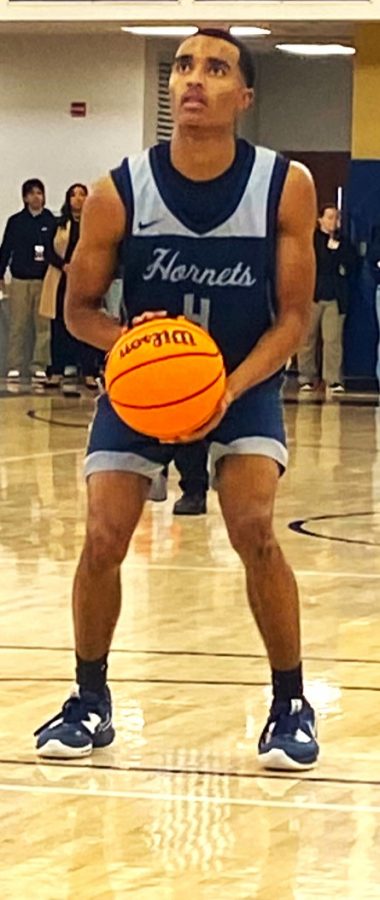 Freshman guard Sean Newman Jr. prepares to shoot two free throws in the closing minutes of Fullerton College's state championship game win over City of San Francisco College on Mar. 12, 2023.