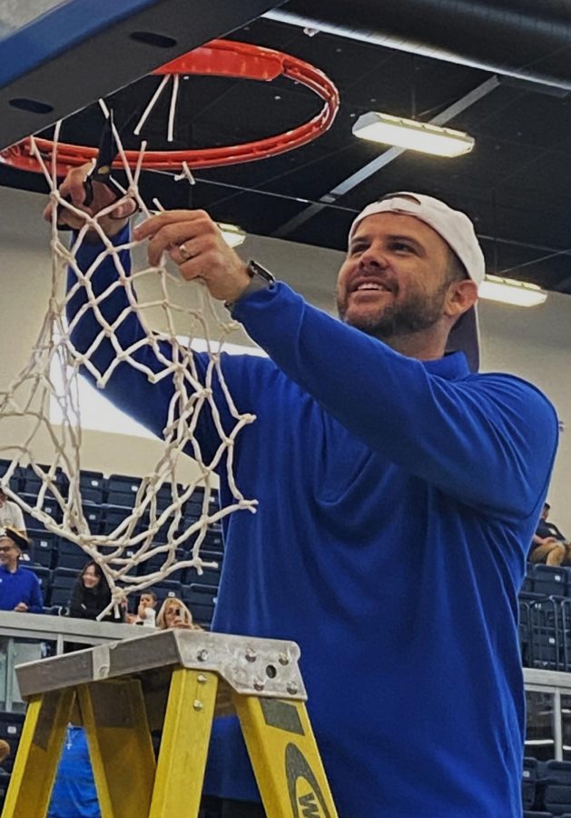 Head Coach Perry Webster is the last one to cut down the entire net following his 2nd CCCAA State championship as a head coach, his first since 2019 on Mar. 12, 2023.