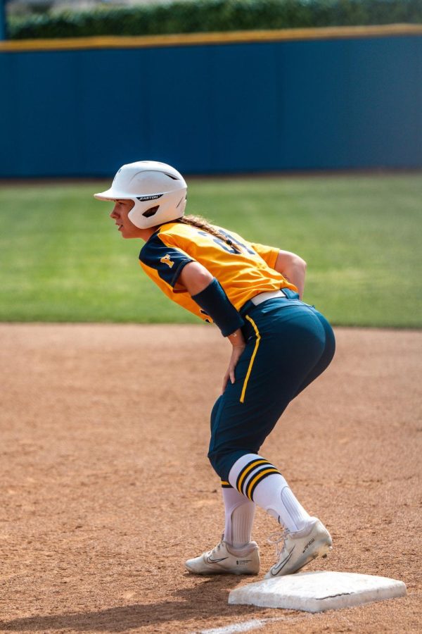 Alyssa Caulford, the Hornets sophomore outfielder, looking to steal first base during Tuesday's losing home game on April 18, 2023.
