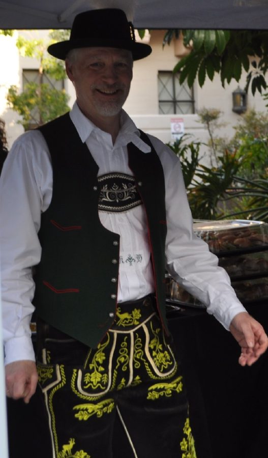 German professor and advisor of the German Club, Klaus Hornell, organizer of the Cultural and Film event, as well as a member of the Schuhplattler dancers, dressed in traditional German clothing.