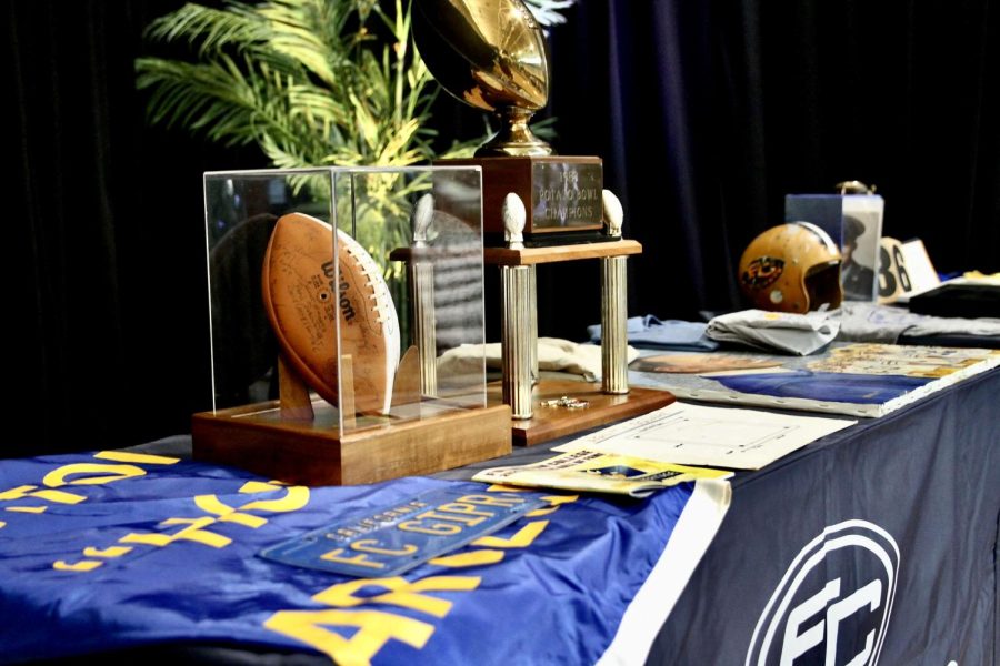 The 2023 Hall of Fame Ceremony included a table with 1983 football memorabilia. Photo credit: Yasmin Sotelo