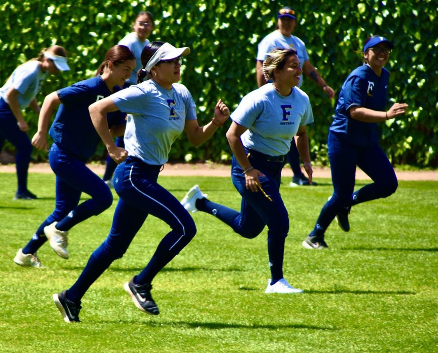 The Hornets run team sprints before practice begins. Freshman Dallas Garcia (far right) is frustrated with the bullpen situation the Hornets have to deal with.