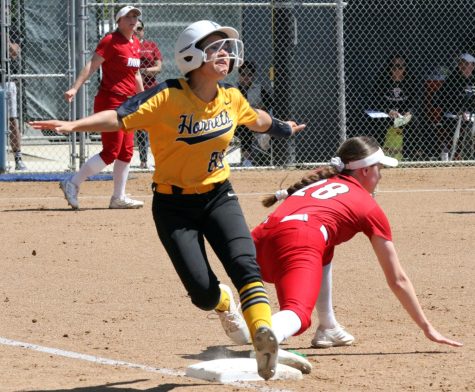 Freshmen outfielder Jordan Elias pleads her cases to the umpire that shes safe after her hit on Saturday April 1, 2023 at Fullerton College against Santa Ana. Photo credit: Yasmin Sotelo