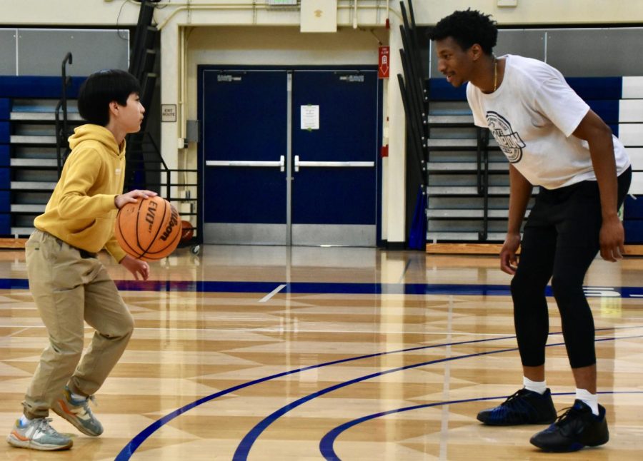 Hung has many passions and basketball is one of them, as he goes one on one with Mike Ofoegbu sophomore guard for the state champion Hornets basketball team.