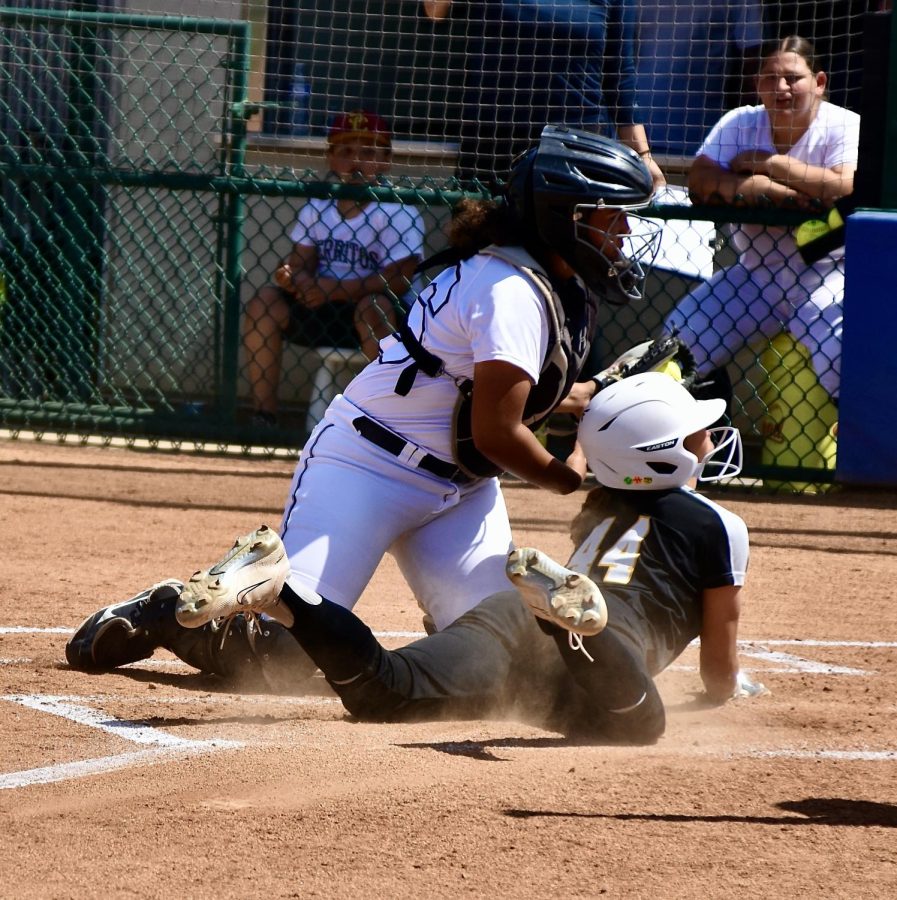 Freshman shortstop Cassidy Hornung gets an unearned run during a Falcons infield error, as she slides home during game 1 of the Super Regionals at Cerritos on Friday, May 12, 2023. Photo credit: Gerardo Chagolla