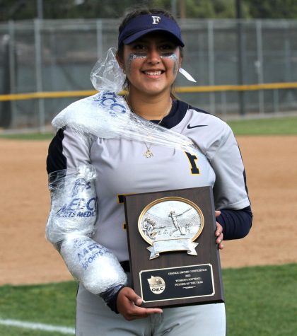 Fuentes receives her OEC Pitcher of the Year plaque after dominating Game One of the SoCal Regionals. “This is one of the biggest accomplishments in my softball career,” says Fuentes. When she got her plaque and found out that she won OEC Pitcher of the Year, “I felt really surprised and excited and I wasnt expecting it to be honest,” says Fuentes. Photo Credit: Yasmin Sotelo