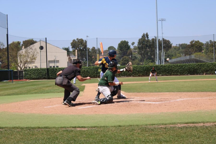 Freshman outfielder Britton Beeson attempts to hit a thrown ball from pitcher at Hornets vs Monarchs game on Friday, May 12, 2023.