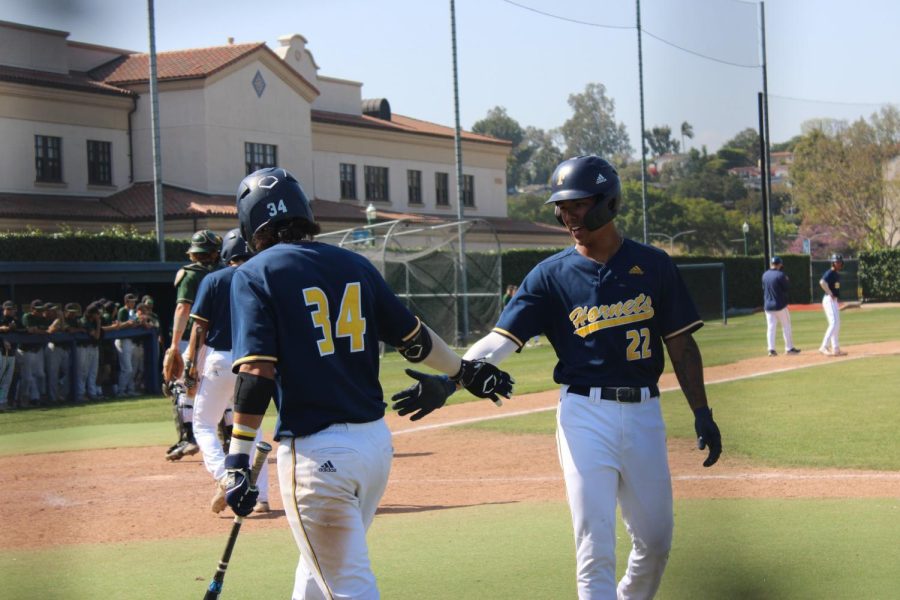 Sophomore outfielder Isaia Marquez scored a run and saluted next on bat freshman infielder Tank Espalin at Hornets vs Monarchs game on Friday, May 12, 2023.