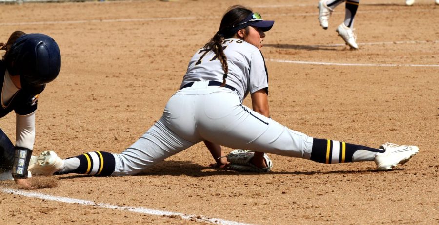 Sophomore first baseman Meah Almaraz goes full extension to get the out at first at Fullerton College against College of the Canyons on Friday May 5, 2023. Photo credit: Yasmin Sotelo