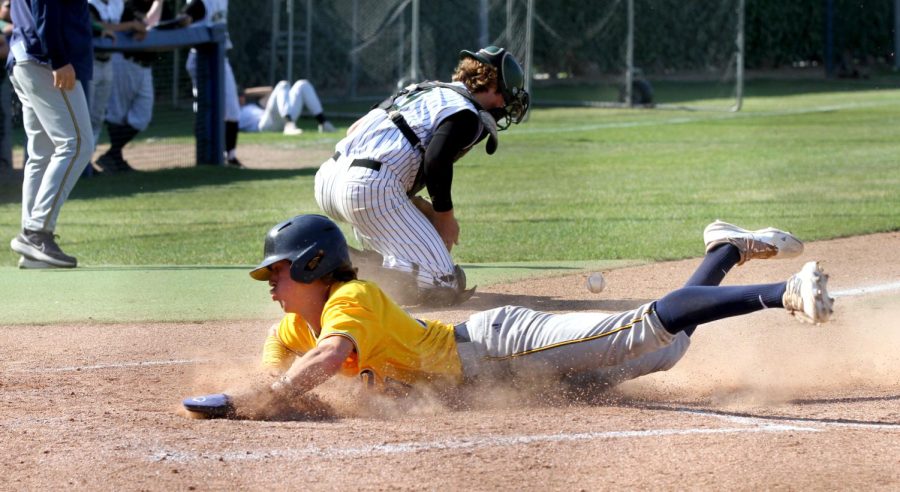 Freshmen Diego Franco comes in to score on a single through the left side from freshmen Landon Runge in the bottom of the third inning at Fullerton College against La Valley on Saturday, May 13, 2023. Photo credit: Yasmin Sotelo