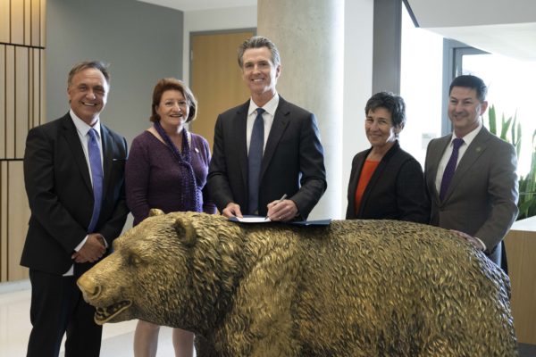 California State Governor Gavin Newsom (middle) alongside (left to right) Assembly member Rick Chavez Zbur, President pro Tempore Toni Atkins, Senator Susan Eggman and Assembly member Christoper Ward, for SB 447 signing on Wednesday, Sept. 13, 2023(left to right.)