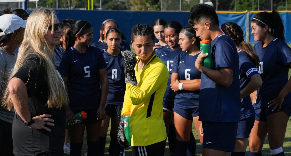 The Hornets huddle around their defensive anchor, goalie Nyla Contreras, discussing defensive strategies during their home game on Friday, Sept. 15, 2023.