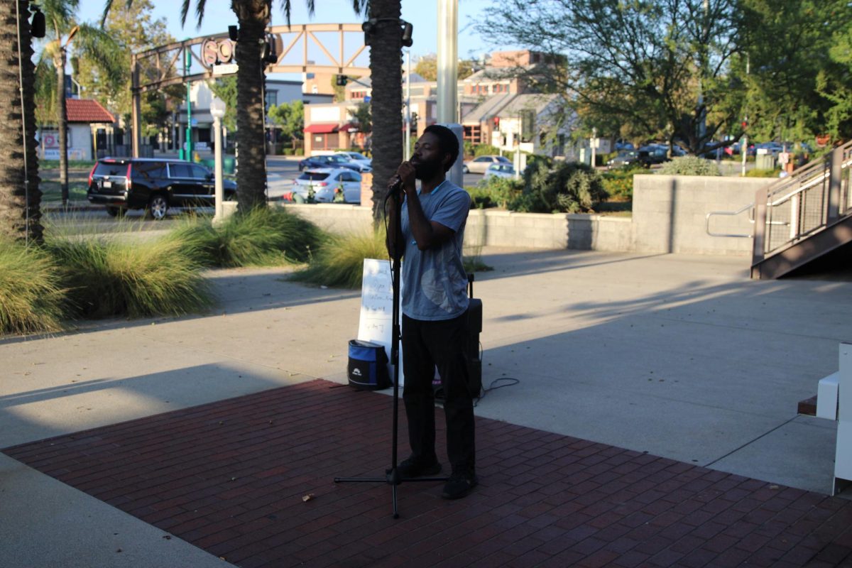 Kris “Zero” Rimpson singing at the Ground Zero Outdoor Open Mic show in Fullertons SOCO District on Sunday Sept. 10, 2023.