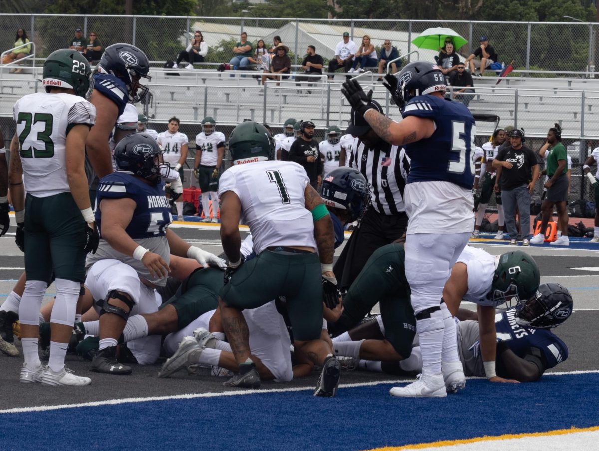 The Fullerton College Hornets look to score another touchdown in the first quarter at Sherbeck Field on Saturday, Sept. 16.