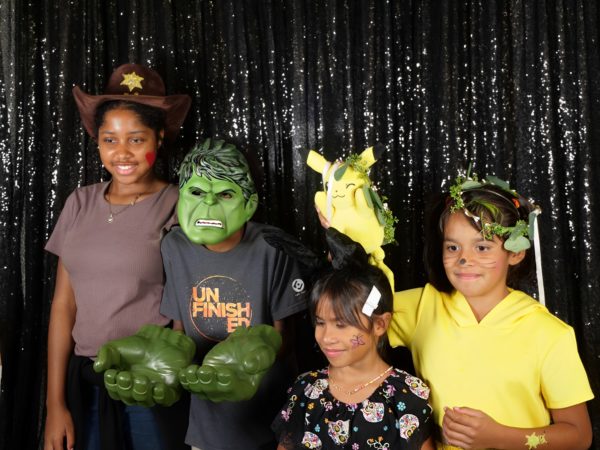 Children smile for the camera, courtesy of Novasky Photography.  Its in the hands of the Hulk during the Little Monster Mash on Friday, Oct. 13.
