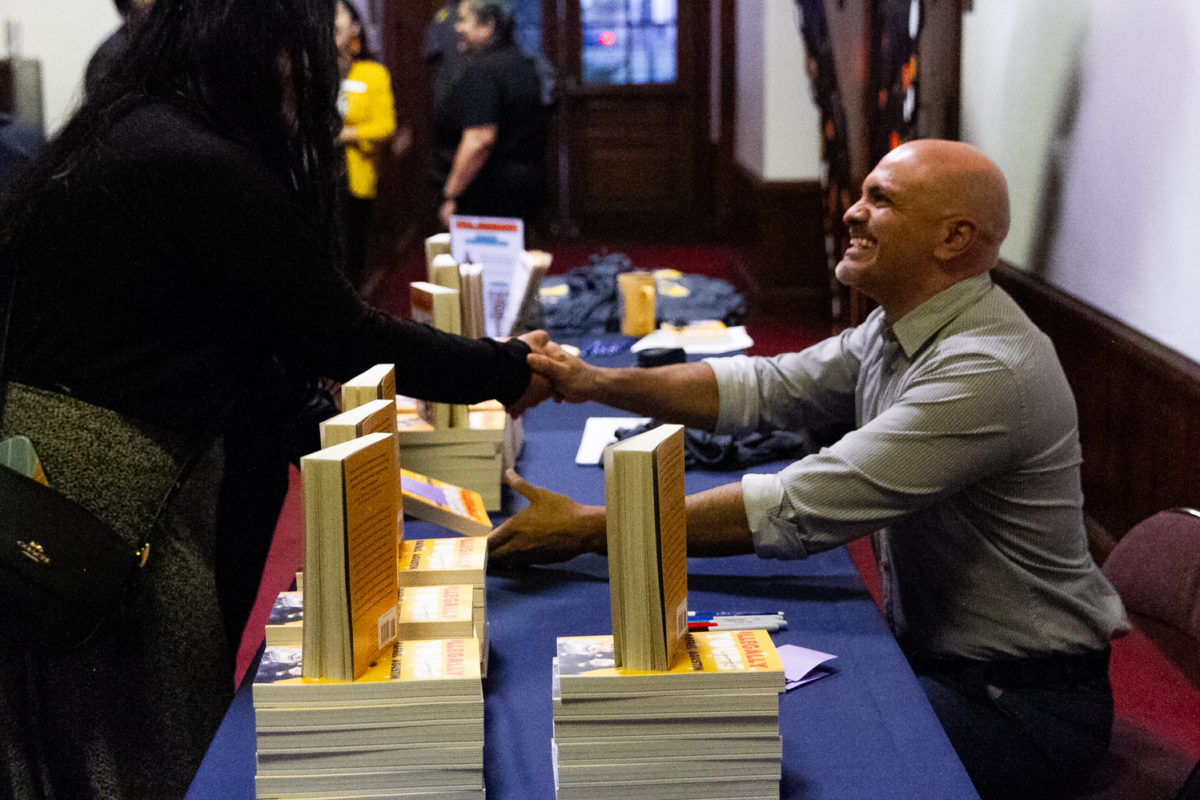 Rafael Agustin meets students at his book signing on Oct. 16, 2023.