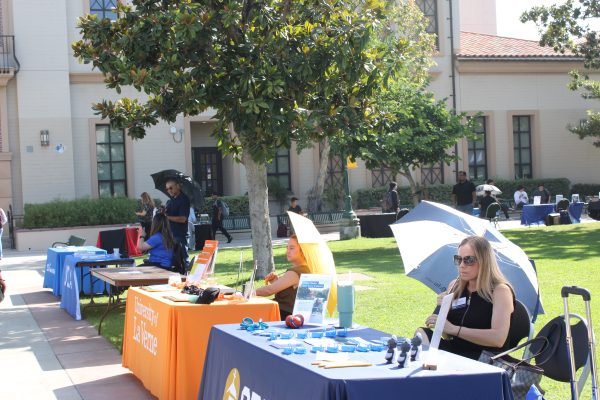 4-year university transfer advisors attend the Transfer Fair in Fullerton Colleges main quad on Tuesday, Oct. 17, 2023. They advise students on the process of transferring to their individual institutions.