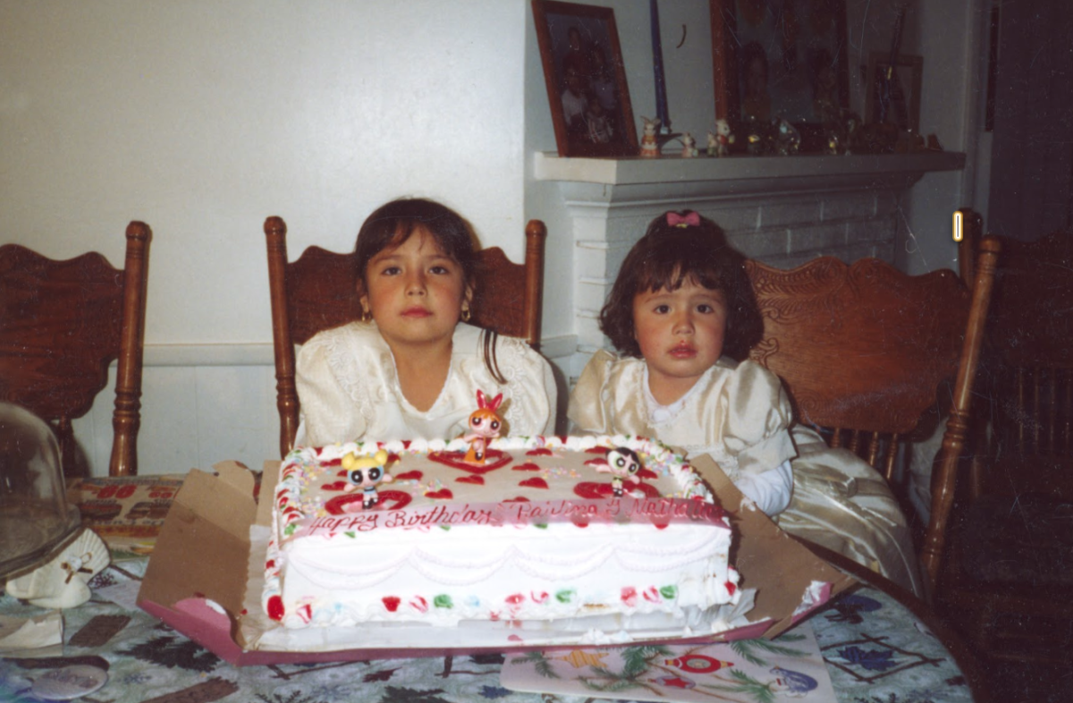 Sisters, Natalie (left) and Paulina Alonso (right), share their birthday celebrations with a cake picked by their mother.