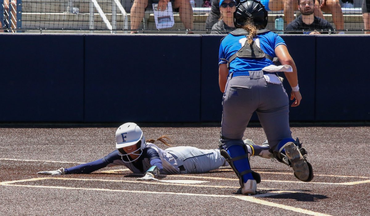 Sophomore outfielder Hailey Garcia diving home to put the Hornets up 3-2 in the bottom of the 5th inning on Friday May 17, 2024. 
