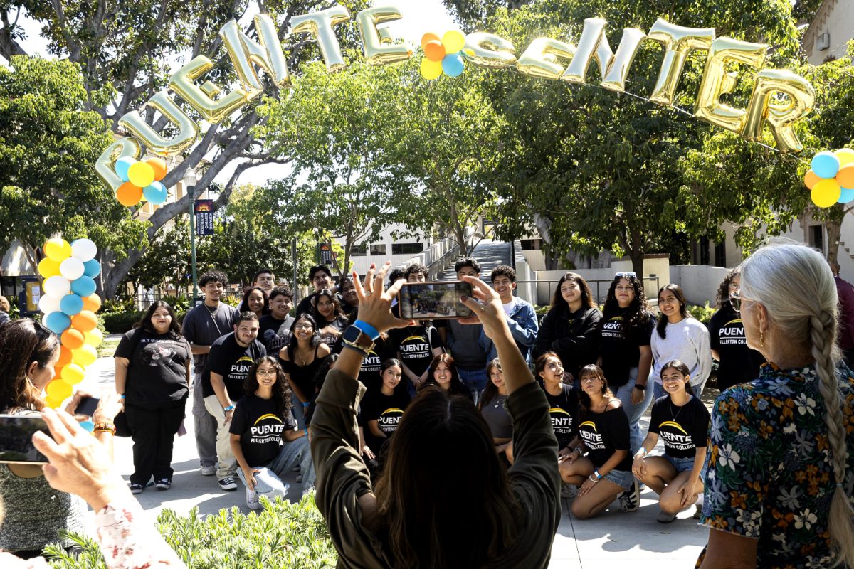 Puente students gather for a group photo as counselors and instructors take photos. September 12, 2024.