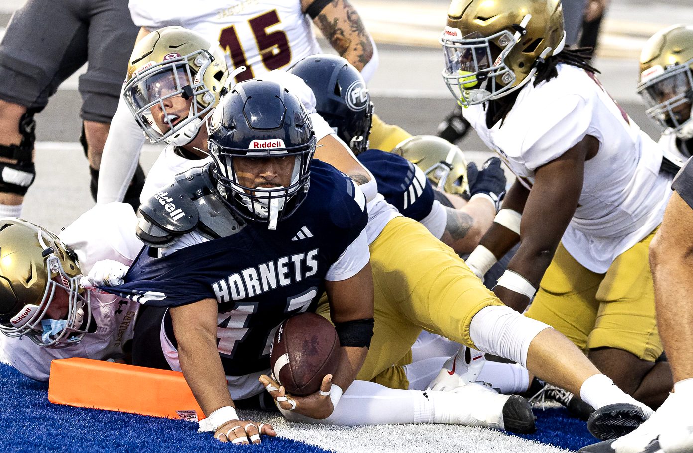 Elvis Vakapuna catches a 9-yard pass. He runs into the touchdown as multiple Jaguar defenders try to stop him on his second touchdown on Oct. 5, 2024.