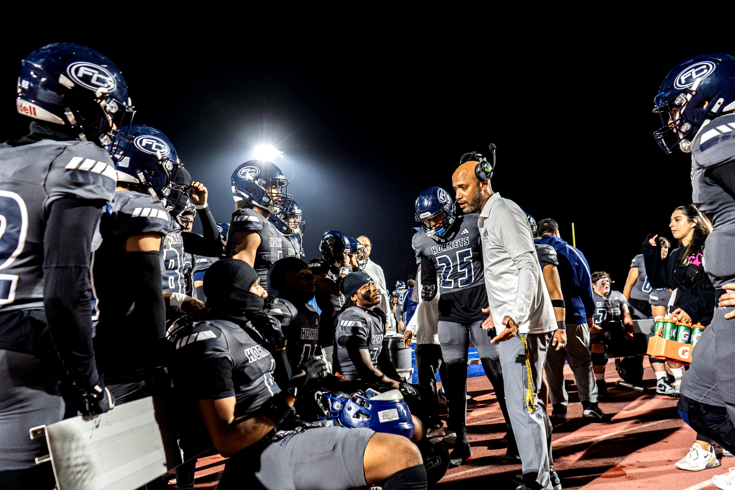 Tight Ends Co-Head Coach Phil Austin addressed the players technique at the Homecoming Game at Fullerton College on Oct. 17, 2024.