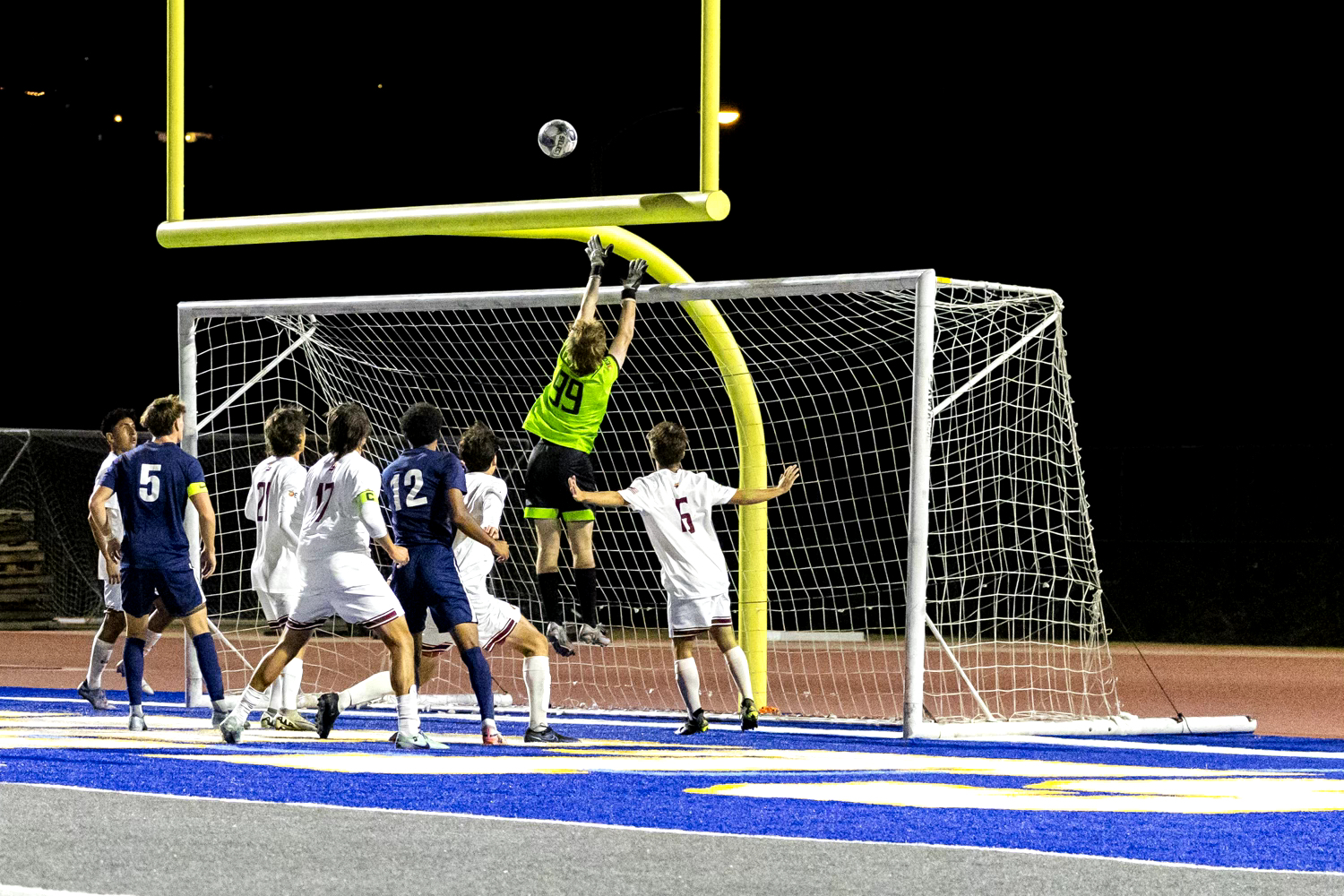 Saddleback goalkeeper Tyler Bourbonnais covers the crossbar as the ball sails over on Friday, Nov. 15, 2024.