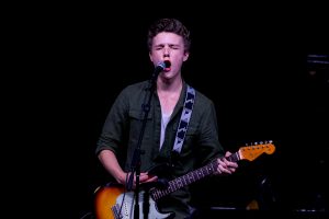 Austin Thomason performs an original song while playing the guitar on Thursday, Nov. 21, 2024.