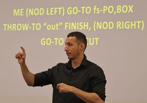 ASL adjunct professor Eddie Gutierrez demonstrates sign language during his class on Nov. 20, 2024. “Communication barriers are a reality for many deaf individuals, and I firmly believe that everyone can benefit from participating in a sign language course,” said Gutierrez.
