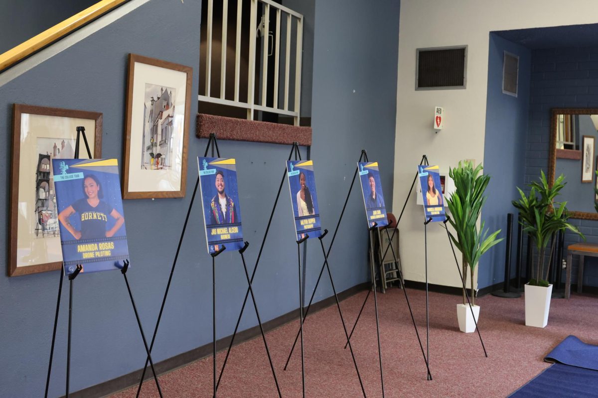 Photo portraits of the cast were displayed on the blue carpet for "The College Tour Watch Party" at the Campus Theater on Feb. 7, 2025.