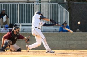 Trevor Schmidt knocks the ball, helping Nate Pone bring in another run for the team at the home game vs. Southwestern College on Feb. 25, 2025.