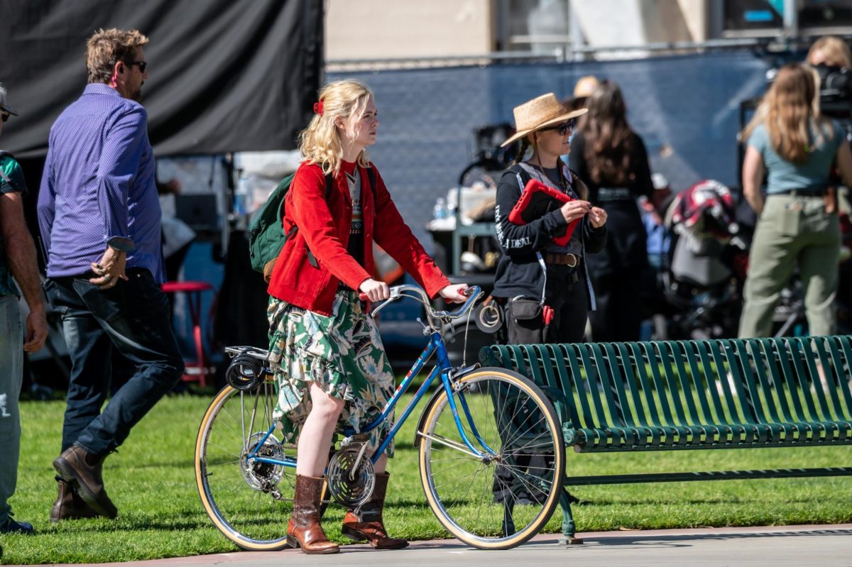 Actress Elle Fanning during the filming set of "Margot's Got Money Troubles" at the Fullerton College campus quad on March 4, 2025. 