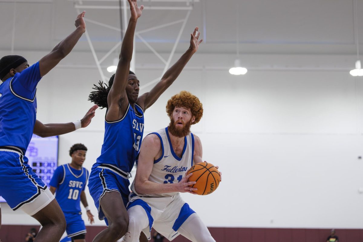 Joe Grahovac is double-teamed by the San Bernardino Valley College defenders as he is trying to score in the paint in the semi-final game of the 3C2A State Tournament in Mt. San Antonio College Walnut, Calif. on Saturday, March 15, 2025