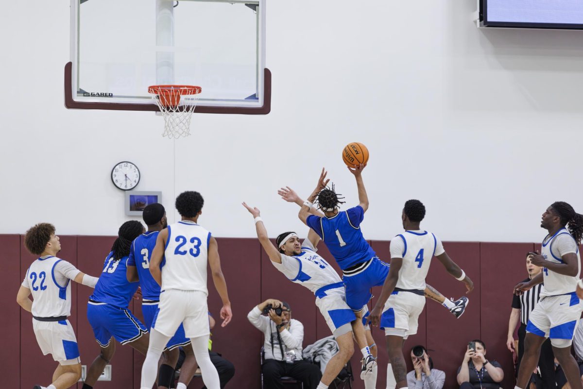 Brayden Smith gets fouled by Jason Lee which gives the hornets possession of the ball  in the semi-final game of the 3C2A State Tournament in Mt. San Antonio College Walnut, Calif. on Saturday, March 15, 2025